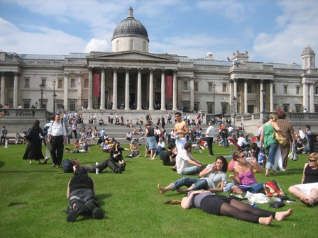 Kids on grass under Nelson's eye